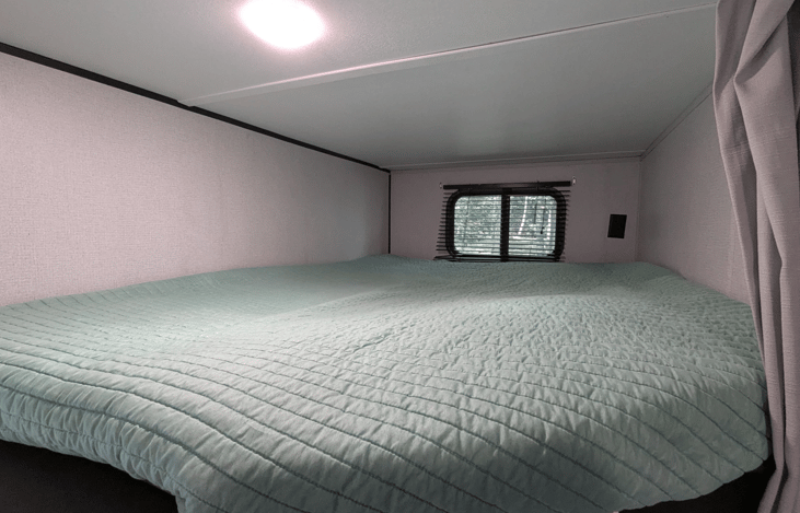 Large cozy bunks with USB charging ports.