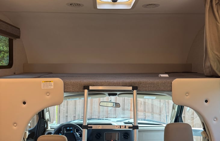 Full bed above cab, sleeps 2