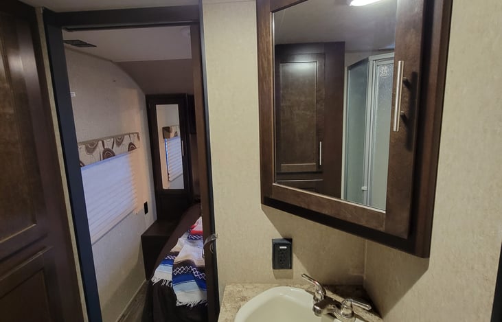 Medicine cabinet with plenty of other cabinets for storage