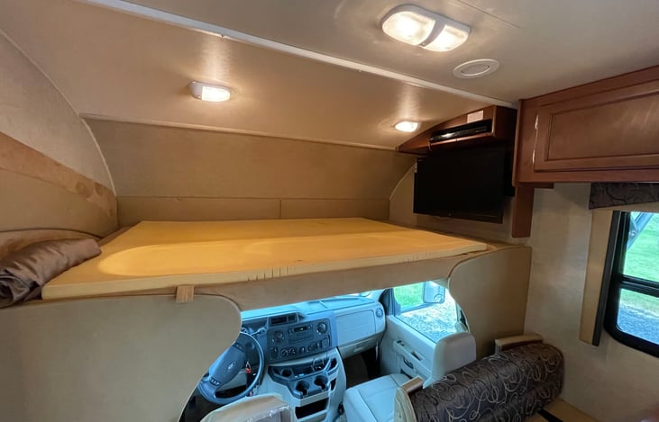 Huge sleeping area above the cab.  Extra comfort memory foam pad as well.