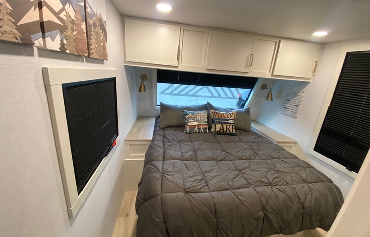 Egyptian linens and body pillows on an Olympic size Queen bed!! 🛌