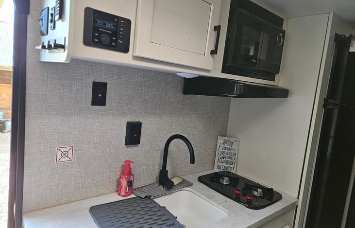 2 burner stove.
Microwave (with plug in power or generator)