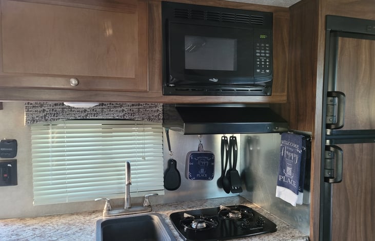 Stocked kitchen, dining set of 4, dinner plates, salad plates, cereal bowls, drinking cups, hot drink cups & lids, silverware, cooking utensils, pots&pans, water pitcher, elect. toaster & coffee maker