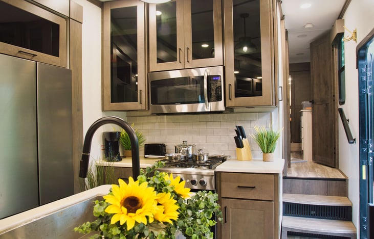 Convection microwave and a 4 burner stove & oven are there to help.