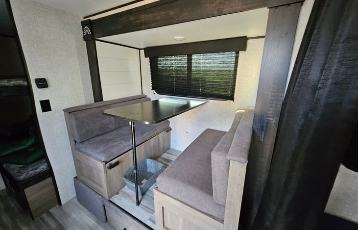 Dinette that converts to sleeper.