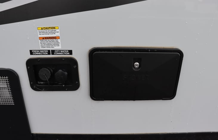 Outdoor shower and city water connections.