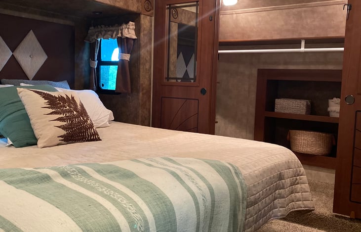 Master bedroom with large dresser and closet big enough to fit pack-n-play

(Staged Photo)