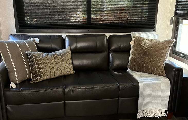 Couch folds out into a king size bed