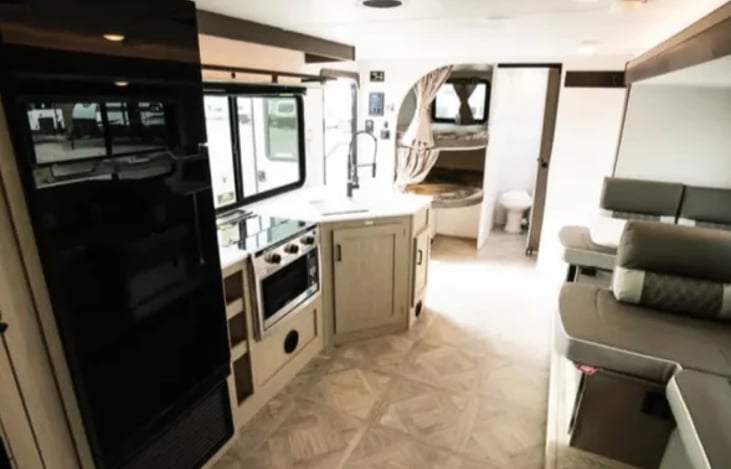 Kitchen with full size refrigerator