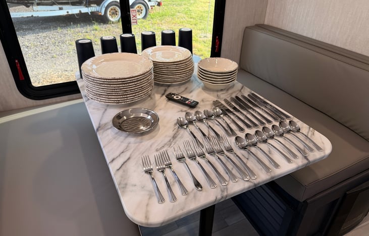 Plates, Cups, Dishes, Forks, Knives, spoons are included with every rental.