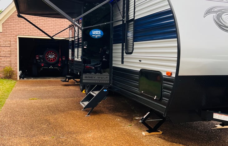 Exterior with awning out.