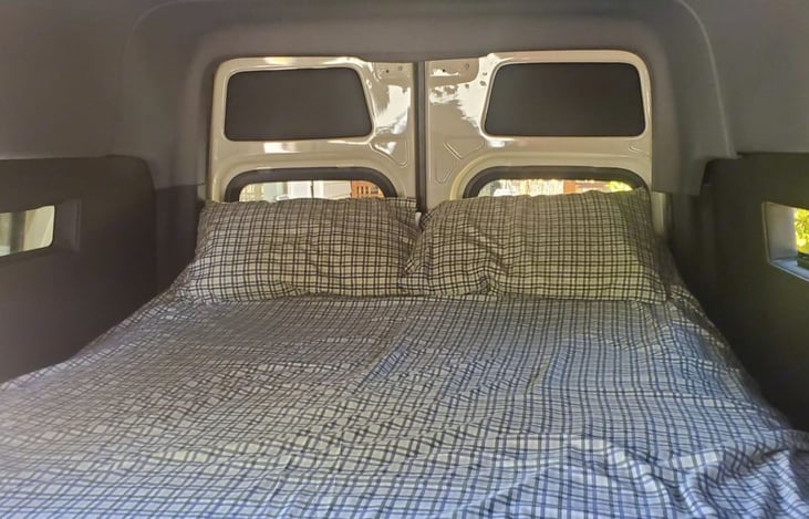 A hotel quality Queen size bed with 6 inches of extra storage on each side!