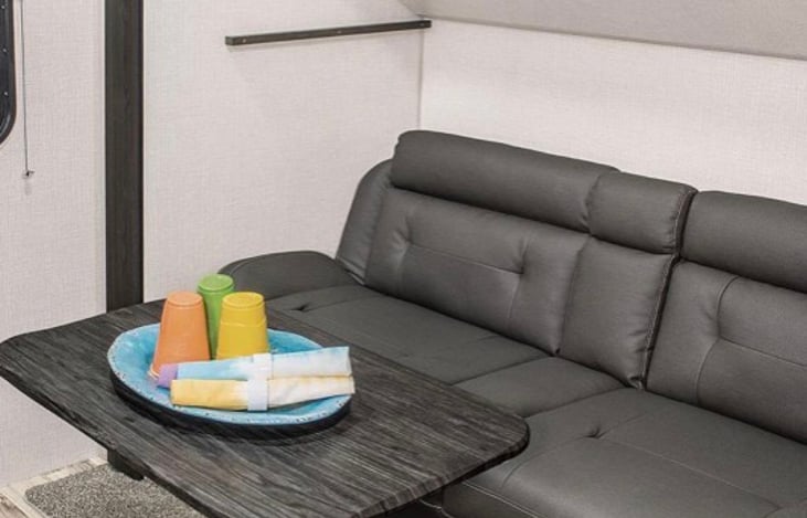 Couch and table in bunkhouse