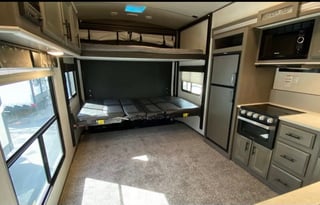 set up and deliver kid friendly toy hauler