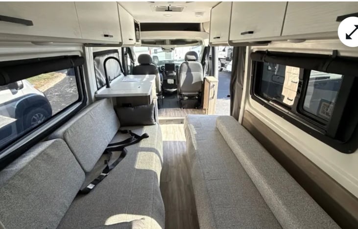 2 Beds or can be put together for Queen & Storage underneath passenger side bed Also Storage on both sides above beds.