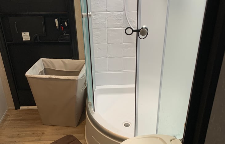 The bathroom has its own outside entrance to prevent tracking water, sand, etc. if coming in from the beach or pool, and a full size shower to accommodate your family’s comfort.