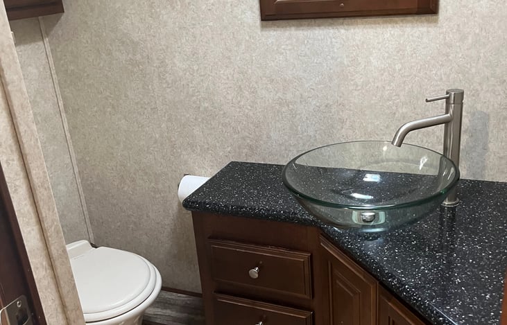 Convenient Half Bath – No Waiting. No Hassle.
Located mid-coach for easy access. The half bath in this Georgetown XL offers added convenience, especially when traveling with family or friends.