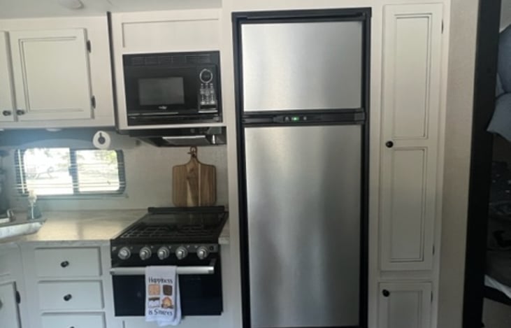 Pantry, Fridge and freezer, microwave, oven and cutting board