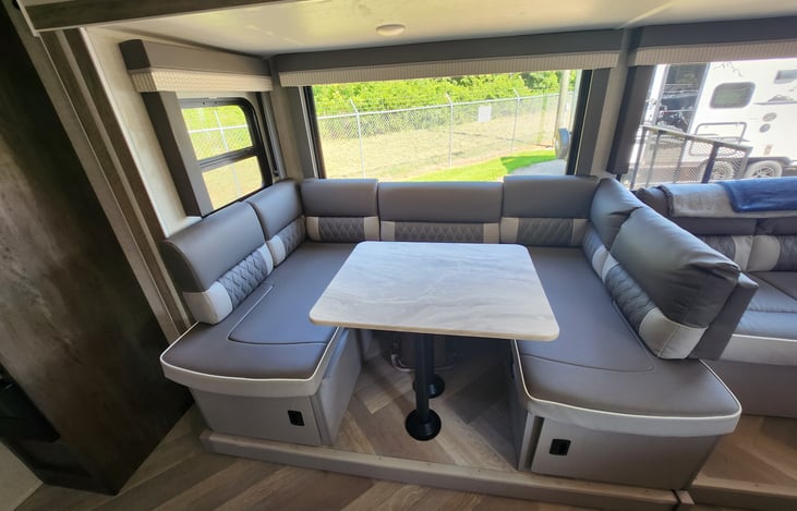 Dining table and storage underneath.