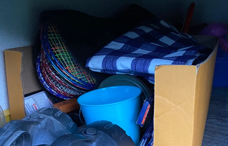 Our camper comes with lots of outdoor toys, folding chairs, candles, flashlights, pans, and an outdoor camp stove.