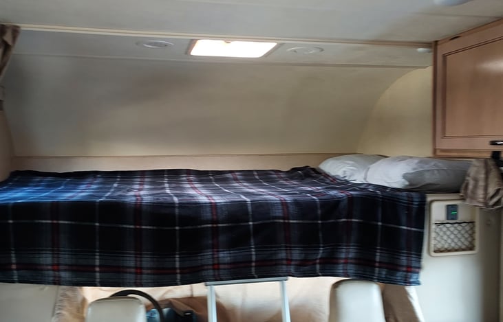 Bunk over cab. Can sleep 2 adults