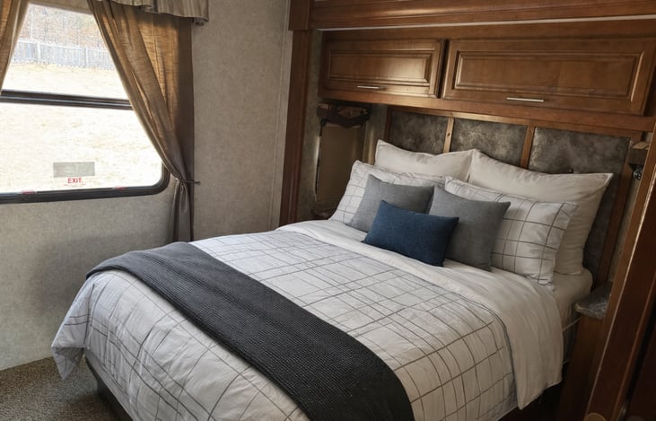 Queen size master bed.