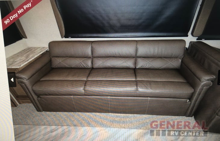 sofa - dealership photo of this motorhome