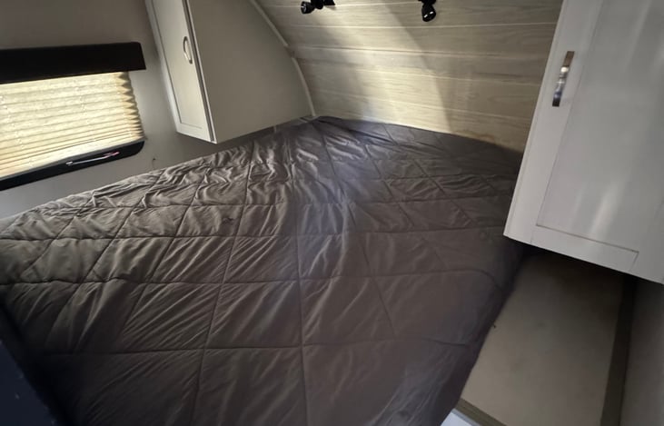 Master bedroom, closet space and queen size bed