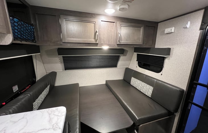 Dinette converted to bed. Can fit 2 adults.