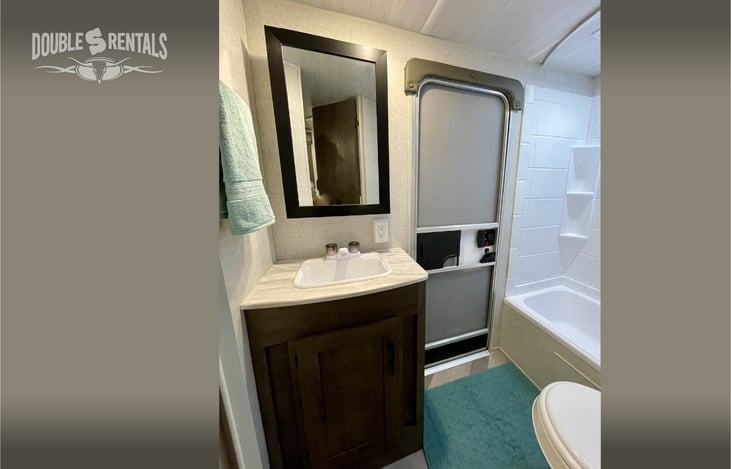 Bath with it's Own Exterior Entrance and Large Shower/Tub Combo with Skylight