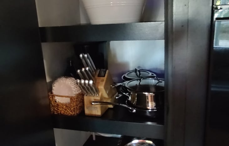 Comes with all your cookware, coffee pot and plate settings and large pantry.