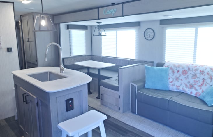 Kitching table that turns into a bed for one person.