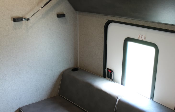 Top Right Bunk Folds Up When Not Needed to Allow for Additional Headroom While Sitting on Play Cube Watching TV.