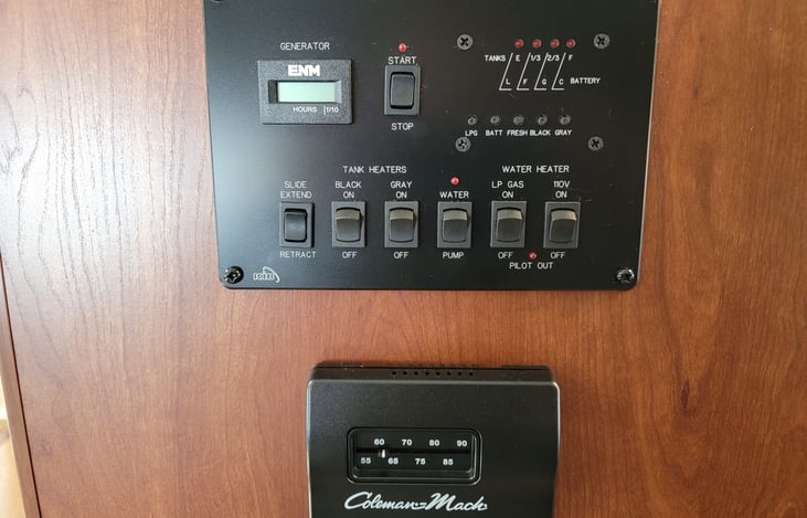 Monitor panel - Water Heater (6 gal) Propane or Electric / Indicators for checking water, waste tanks, propane, & battery levels / Generator control / 12V on-demand Water Pump. Thermostat AC/Heat