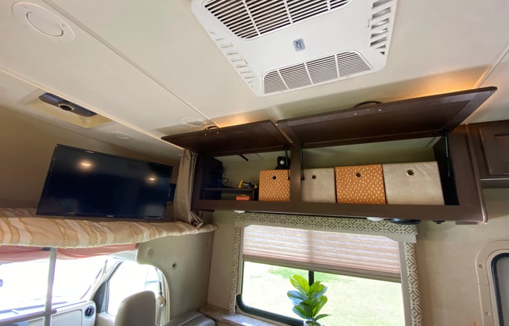 SmarTV, DVD Player, Bins containing board and card games as well as a few children's activities.