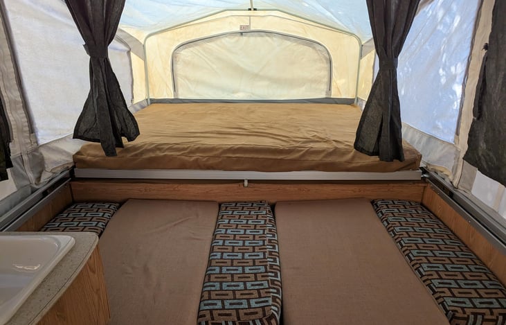 Righ side of the camper. The bed on this side also converts to dining table.