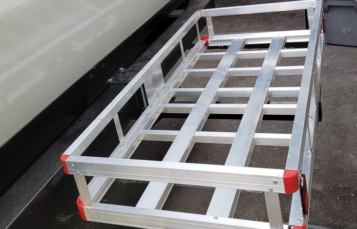 Rear bumper Cargo Rack available for $5 day. Perfect for generator and/or firewood.