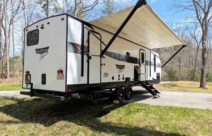 2023 Wildwood Platinum: Luxury family-ready rig with a King Master, double bunks, and Versa-Lounge. Enjoy the fireplace, bright modern interior, panoramic windows, outdoor kitchen large awning and mor