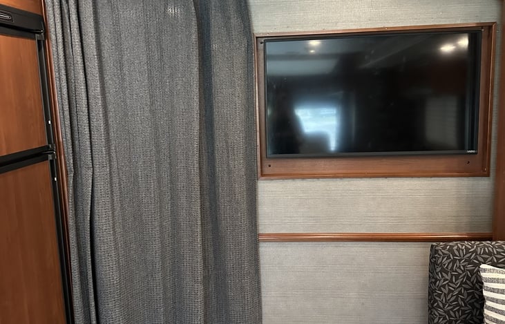 Privacy curtain for those sleeping in the bunkbeds or getting out of the bathroom
