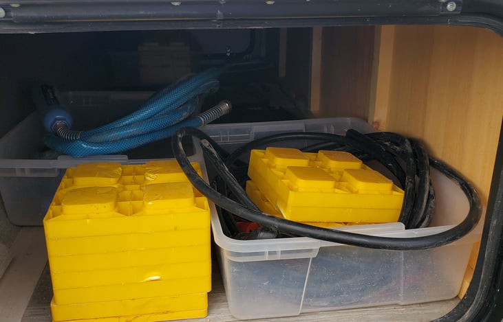 all hoses, leveling, electrical, in storage