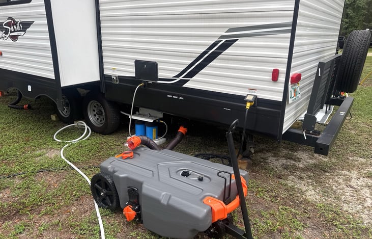 Portable waste tank available only upon request