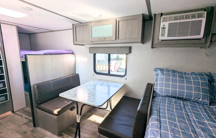 The dinette converts to an extra bed