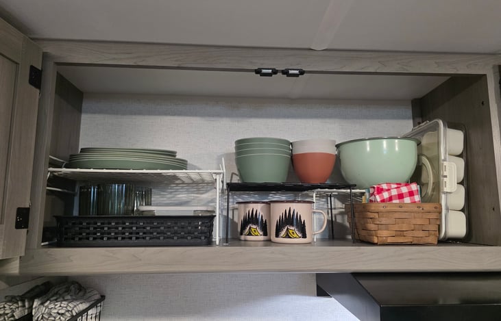Tableware for 4. Not pictured are cast iron pans, saucepans, and cooking/grilling utensils.