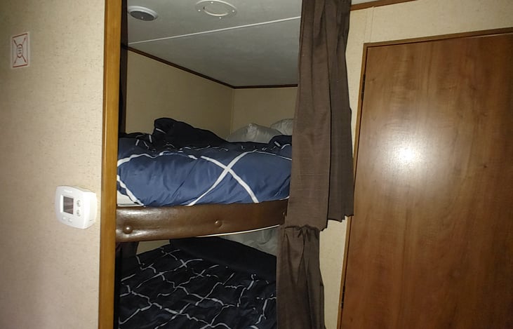 2 Bunk Beds, Full Size, each can hold two adults