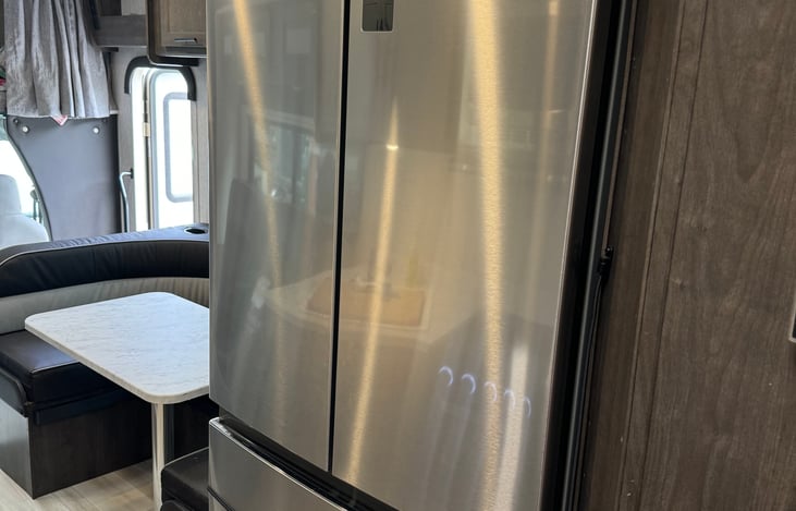 Full size refrigerator with two deep freezers