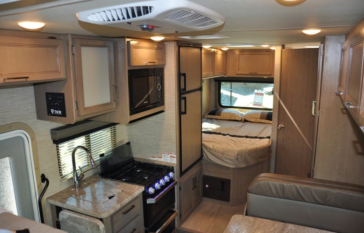 Kitchen and queen bed