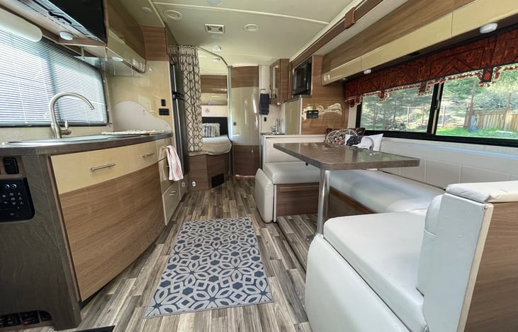 Dining and Lounging  space- the table comes out and this makes into a super cozy couch or bed