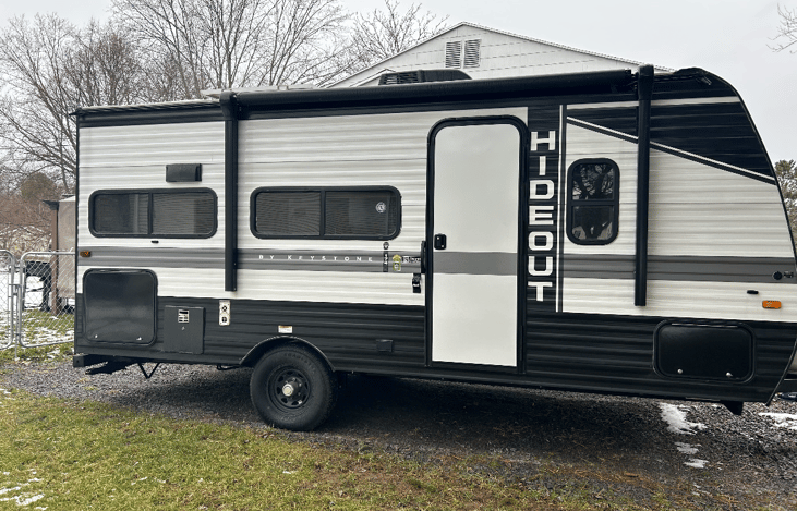 Side of the unit showing additional storage compartments under the unit.