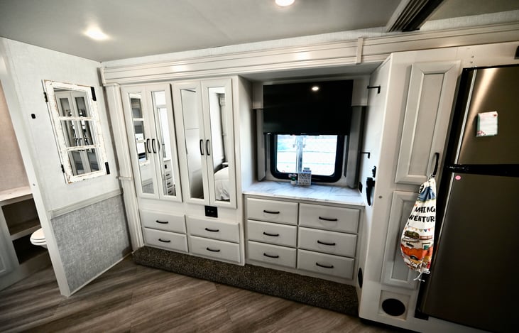 Owner Suite Closets and Wardrobe, 40 inch Smart TV