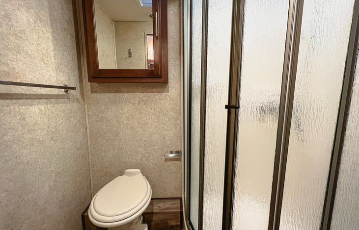 Bathroom and large shower.